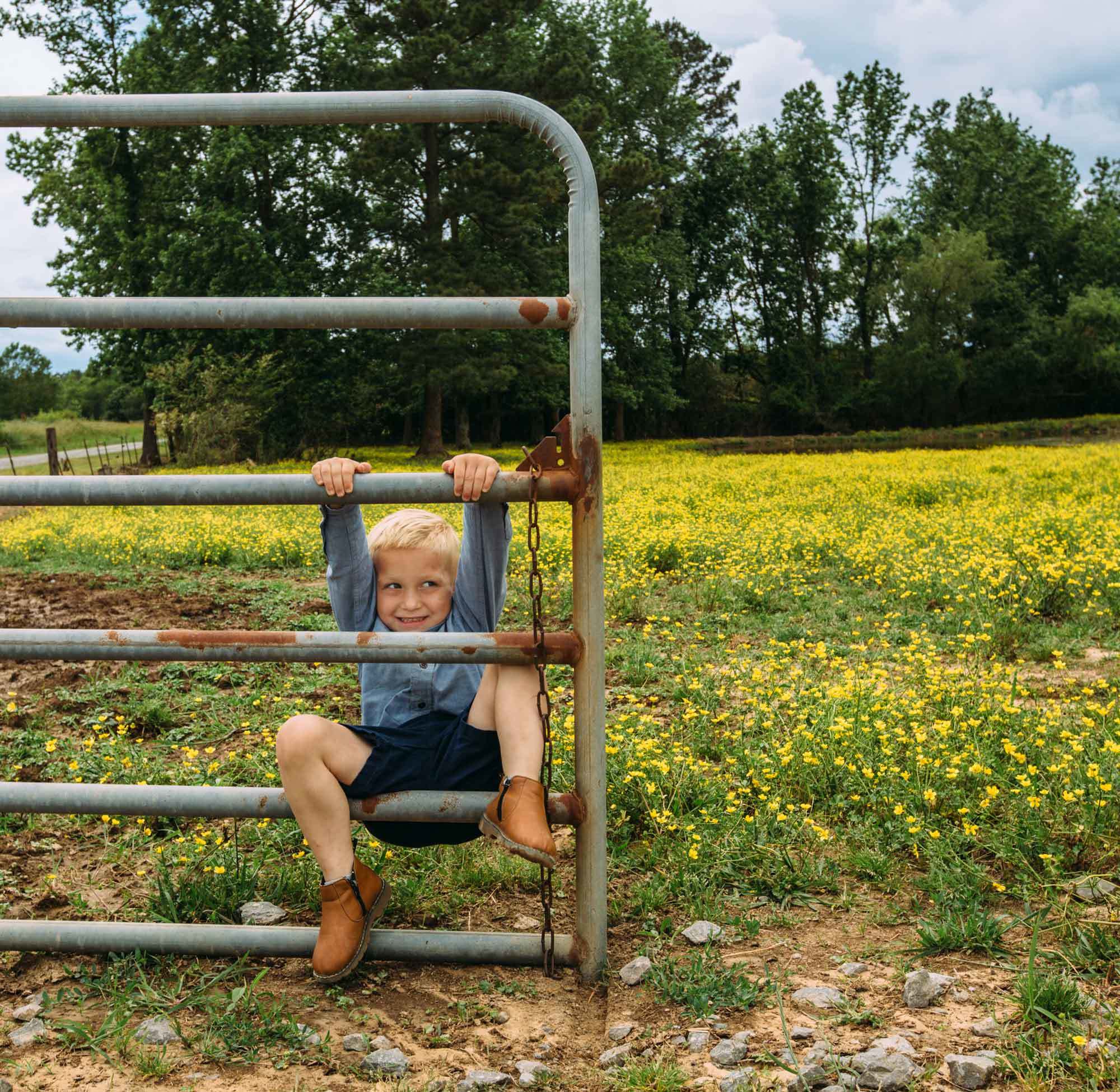 boy on fence