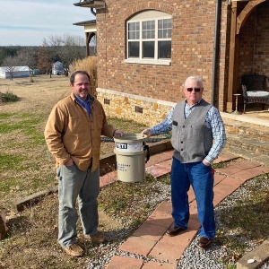 chuck roberts presents prize to greg key